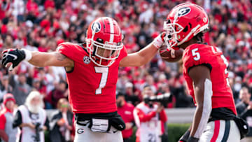 Jermaine Burton celebrates his touchdown with Adonai Mitchell. (Photo by Steven Limentani/ISI Photos/Getty Images)