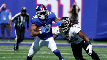 Sep 26, 2021; E. Rutherford, N.J., USA; New York Giants wide receiver Kenny Golladay (19) runs with the ball as Atlanta Falcons linebacker Steven Means (55) defends at MetLife Stadium. Mandatory Credit: Robert Deutsch-USA TODAY Sports