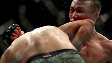 DENVER, CO - NOVEMBER 10: Chan Sung Jung is hit with a knock-out elbow from Yair Rodríguez with four seconds left in the fifth and final round to end their Featherweight bout during the UFC Fight Night 139 at the Pepsi Center on November 10, 2018 in Denver, Colorado. (Photo by Matthew Stockman/Getty Images)