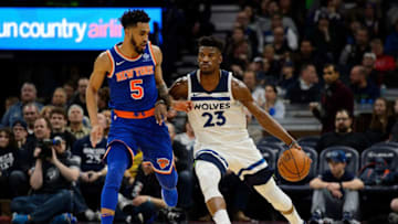 MINNEAPOLIS, MN - JANUARY 12: Jimmy Butler #23 of the Minnesota Timberwolves dribbles the ball against Courtney Lee #5 of the New York Knicks during the game on January 12, 2018 at the Target Center in Minneapolis, Minnesota. NOTE TO USER: User expressly acknowledges and agrees that, by downloading and or using this Photograph, user is consenting to the terms and conditions of the Getty Images License Agreement. (Photo by Hannah Foslien/Getty Images)