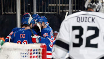 NEW YORK, NY - FEBRUARY 09: Gregg McKegg #14 of the New York Rangers celebrates with teammates after scoring a goal in the first period against Jonathan Quick #32 of the Los Angeles Kings at Madison Square Garden on February 9, 2020 in New York City. (Photo by Jared Silber/NHLI via Getty Images)
