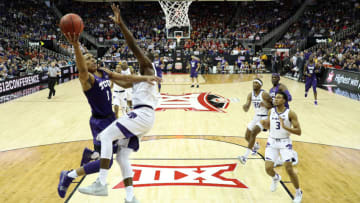 KANSAS CITY, MISSOURI - MARCH 14: Desmond Bane #1 of the TCU Horned Frogs drives on a fast break as Makol Mawien #14 of the Kansas State Wildcats defends during the quarterfinal game of the Big 12 Basketball Tournament at Sprint Center on March 14, 2019 in Kansas City, Missouri. (Photo by Jamie Squire/Getty Images)