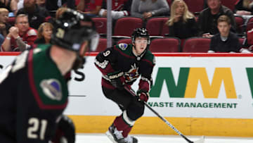 GLENDALE, ARIZONA - NOVEMBER 02: Clayton Keller #9 of the Arizona Coyotes skates with the puck against the Colorado Avalanche at Gila River Arena on November 02, 2019 in Glendale, Arizona. (Photo by Norm Hall/NHLI via Getty Images)