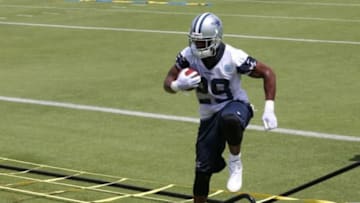 Jun 17, 2014; Dallas, TX, USA; Dallas Cowboys running back DeMarco Murray (29) runs drills during minicamp at Cowboys headquarters at Valley Ranch. Mandatory Credit: Matthew Emmons-USA TODAY Sports