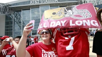 Sep 7, 2014; Arlington, TX, USA; San Francisco 49ers fans Nichole and Roy Rodriquez take a selfie at AT&T Stadium before the game against the Dallas Cowboys. Mandatory Credit: Tim Heitman-USA TODAY Sports