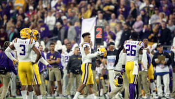 GLENDALE, ARIZONA - JANUARY 01: Safety Grant Delpit #9 of the LSU Tigers walks off the field after being ejected for targeting during the first half of the PlayStation Fiesta Bowl between LSU and Central Florida at State Farm Stadium on January 01, 2019 in Glendale, Arizona. (Photo by Christian Petersen/Getty Images)