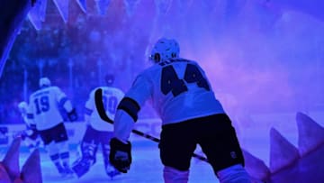 SAN JOSE, CA - DECEMBER 22: Marc-Edouard Vlasic #44 of the San Jose Sharks takes the ice through the Shark Head against the Los Angeles Kings at SAP Center on December 22 2018 in San Jose, California (Photo by Brandon Magnus/NHLI via Getty Images)