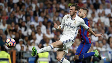 MADRID, SPAIN - APRIL 23: Gareth Bale of Real Madrid shoots on goal under pressure from Jordi Alba of FC Barcelona during the La Liga match between Real Madrid and FC Barcelona at Estadio Santiago Bernabeu on April 23, 2017 in Madrid, Spain. (Photo by Angel Martinez/Real Madrid via Getty Images)
