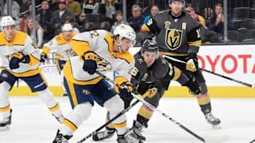 LAS VEGAS, NV - JANUARY 2: Kevin Fiala #22 of the Nashville Predators and Erik Haula #56 of the Vegas Golden Knights skate to the puck during the game at T-Mobile Arena on January 2, 2018 in Las Vegas, Nevada. (Photo by Jeff Bottari/NHLI via Getty Images)