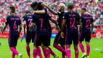 GIJON, SPAIN - SEPTEMBER 24: Arda Turan of FC Barcelona celebrates after scoring his team's fourth goal during the La Liga match between Real Sporting de Gijon and FC Barcelona at Estadio El Molinon on September 24, 2016 in Gijon, Spain. (Photo by Juan Manuel Serrano Arce/Getty Images)