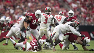Sep 18, 2016; Glendale, AZ, USA; Tampa Bay Buccaneers quarterback Jameis Winston (3) is swarmed by the Arizona Cardinals defense during the second half at University of Phoenix Stadium. The Cardinals defeat the Buccaneers 40-7. Mandatory Credit: Jerome Miron-USA TODAY Sports