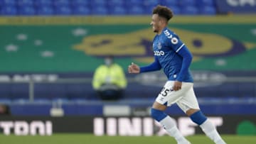 Everton's Ivorian midfielder Jean-Philippe Gbamin runs onto the pitch during the English Premier League football match between Everton and Crystal Palace at Goodison Park in Liverpool, north west England on April 5, 2021. - RESTRICTED TO EDITORIAL USE. No use with unauthorized audio, video, data, fixture lists, club/league logos or 'live' services. Online in-match use limited to 120 images. An additional 40 images may be used in extra time. No video emulation. Social media in-match use limited to 120 images. An additional 40 images may be used in extra time. No use in betting publications, games or single club/league/player publications. (Photo by Jon Super / POOL / AFP) / RESTRICTED TO EDITORIAL USE. No use with unauthorized audio, video, data, fixture lists, club/league logos or 'live' services. Online in-match use limited to 120 images. An additional 40 images may be used in extra time. No video emulation. Social media in-match use limited to 120 images. An additional 40 images may be used in extra time. No use in betting publications, games or single club/league/player publications. / RESTRICTED TO EDITORIAL USE. No use with unauthorized audio, video, data, fixture lists, club/league logos or 'live' services. Online in-match use limited to 120 images. An additional 40 images may be used in extra time. No video emulation. Social media in-match use limited to 120 images. An additional 40 images may be used in extra time. No use in betting publications, games or single club/league/player publications. (Photo by JON SUPER/POOL/AFP via Getty Images)