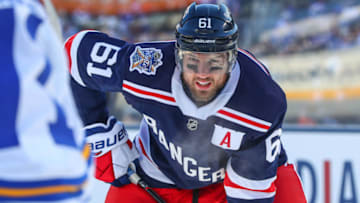 FLUSHING, NY - JANUARY 01: New York Rangers right wing Rick Nash (61) skates during the 2018 Winter Classic between the New York Rangers and the Buffalo Sabres on January 1, 2018, at Citi Field in Flushing, NY. (Photo by Rich Graessle/Icon Sportswire via Getty Images)