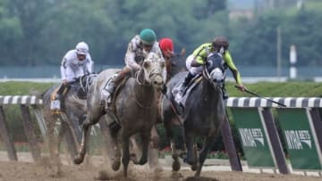 Jun 11, 2016; Elmont, NY, USA; Creator (13) ridden by Irad Ortiz battles in the front stretch with Destin (2) ridden by Javier Castellano during the 148th running of the Belmont Stakes at Belmont Park. Mandatory Credit: Anthony Gruppuso-USA TODAY Sports