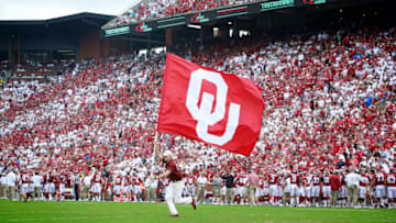 NORMAN, OK - SEPTEMBER 08: A member of the Oklahoma Sooners spirit squad celebrates a touchdown against the UCLA Bruins at Gaylord Family Oklahoma Memorial Stadium on September 8, 2018 in Norman, Oklahoma. The Sooners defeated the Bruins 49-21. (Photo by Brett Deering/Getty Images)