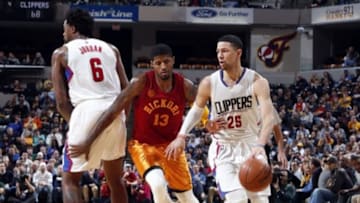 Jan 26, 2016; Indianapolis, IN, USA; Los Angeles Clippers guard Austin Rivers (25) drives to the basket against Indiana Pacers forward Paul George (13) at Bankers Life Fieldhouse. Los Angeles Clippers defeat Indiana Pacers 91-89. Mandatory Credit: Brian Spurlock-USA TODAY Sports