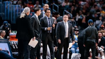 Miami Heat head coach Erik Spoelstra (C) with assistant coaches Chris Quinn (L) and Dan Craig (R) and Juwan Howard Credit: Isaiah J. Downing-USA TODAY Sports