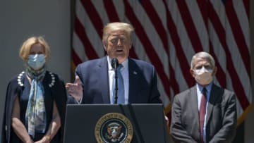 Dr. Deborah Birx, President Donald Trump, and Dr. Anthony Fauci (Photo by Drew Angerer/Getty Images)