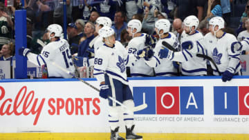 Apr 11, 2023; Tampa, Florida, USA;Toronto Maple Leafs right wing William Nylander (88) is congratulated after he scored a goal against the Tampa Bay Lightning during the first period at Amalie Arena. Mandatory Credit: Kim Klement-USA TODAY Sports