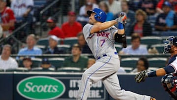 Apr 22, 2016; Atlanta, GA, USA; New York Mets catcher Travis d'Arnaud (7) swings against the Atlanta Braves in the second inning at Turner Field. Mandatory Credit: Brett Davis-USA TODAY Sports