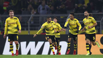 DORTMUND, GERMANY - JANUARY 27: Jeremy Toljan of Dortmund (2n left) celebrates with his team after he scored a goal to make it 2:2 during the Bundesliga match between Borussia Dortmund and Sport-Club Freiburg at Signal Iduna Park on January 27, 2018 in Dortmund, Germany. (Photo by Lars Baron/Bongarts/Getty Images)