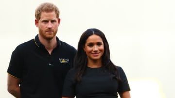 LONDON, ENGLAND - JUNE 29: Prince Harry, Duke of Sussex and Meghan, Duchess of Sussex look on during the pre-game ceremonies before the MLB London Series game between Boston Red Sox and New York Yankees at London Stadium on June 29, 2019 in London, England. (Photo by Dan Istitene - Pool/Getty Images)