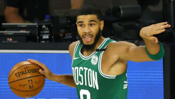 LAKE BUENA VISTA, FLORIDA - AUGUST 19: Jayson Tatum #0 of the Boston Celtics sets up the play against the Philadelphia 76ers during the first quarter in Game Two of the Eastern Conference First Round during the 2020 NBA Playoffs at The Field House at ESPN Wide World Of Sports Complex on August 19, 2020 in Lake Buena Vista, Florida. NOTE TO USER: User expressly acknowledges and agrees that, by downloading and or using this photograph, User is consenting to the terms and conditions of the Getty Images License Agreement. (Photo by Kevin C. Cox/Getty Images)
