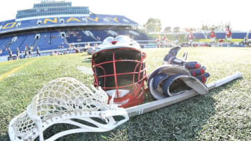ANNAPOLIS, MD - JULY 16: Boston Cannons stick, helmet and gloves on the field before a MLL Lacrosse game against the Chesapeake Bayhawks at Navy-Marine Corps Memorial Stadium on July 16, 2015 in Annapolis, Maryland. (Photo by Mitchell Layton/Getty Images)