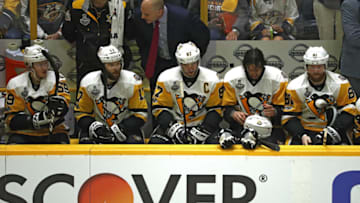 Jake Guentzel #59 and Bryan Rust #17 of the Pittsburgh Penguins. (Photo by Patrick Smith/Getty Images)