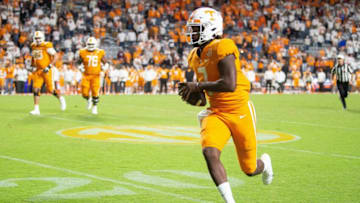 Tennessee quarterback Joe Milton III (7) runs out of bounds on the last play of the game between Tennessee and Ole Miss at Neyland Stadium in Knoxville, Tenn. on Saturday, Oct. 16, 2021.Kns Tennessee Ole Miss Football Bp