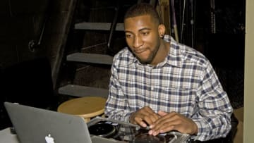 BIRMINGHAM, MI - MARCH 7: Andre Drummond #1 of the Detroit Pistons plays on the disc jockey's sound board after the Pistons Academy Awards ceremony at Birmingham Groves High School on March 7, 2013 in Birmingham, Michigan. NOTE TO USER: User expressly acknowledges and agrees that, by downloading and/or using this Photograph, user is consenting to the terms and conditions of the Getty Images License Agreement. Mandatory Copyright Notice: Copyright 2013 NBAE (Photo by Allen Einstein/NBAE via Getty Images)