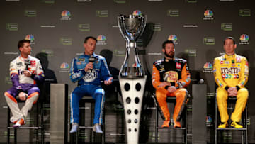 MIAMI, FLORIDA - NOVEMBER 14: (L-R) Denny Hamlin, driver of the #11 FedEx Express Toyota, Kevin Harvick, driver of the #4 Busch Light Ford, Martin Truex Jr., driver of the #19 Bass Pro Shops Toyota and Kyle Busch, driver of the #18 M&M's Toyota speaks with members of the media during NASCAR 2019 Championship 4 Media Day at the Edition Hotel on November 14, 2019 in Miami, Florida. (Photo by Sean Gardner/Getty Images)