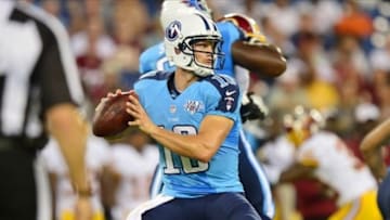 Aug 8, 2013; Nashville, TN, USA; Tennessee Titans quarterback Jake Locker (10) passes against the Washington Redskins during the first half at LP Field. Mandatory Credit: Don McPeak-USA TODAY Sports