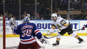 NEW YORK, NEW YORK - DECEMBER 16: Alex Tuch #89 of the Vegas Golden Knights is stopped by Henrik Lundqvist #30 of the New York Rangers at Madison Square Garden in New York City. The Golden Knights defeated the Rangers 4-3 in overtime. (Photo by Bruce Bennett/Getty Images)