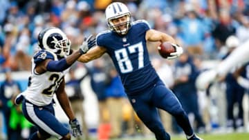 NASHVILLE, TN - DECEMBER 24: Wide Receiver Eric Decker #87 of the Tennessee Titans carries the ball against Safety Lamarcus Joyner #20 of the Los Angeles Rams at Nissan Stadium on December 24, 2017 in Nashville, Tennessee. (Photo by Wesley Hitt/Getty Images)