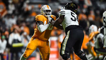 Auburn footballNov 27, 2021; Knoxville, Tennessee, USA; Tennessee Volunteers defensive lineman Ja'Quain Blakely (48) is blocked by Vanderbilt Commodores offensive lineman Tyler Steen (54) during the second half at Neyland Stadium. Mandatory Credit: Bryan Lynn-USA TODAY Sports