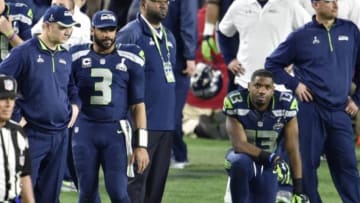 Feb 1, 2015; Glendale, AZ, USA; Seattle Seahawks quarterback Russell Wilson (3) and wide receiver Chris Matthews (13) react on the sidelines at the end of the game against the New England Patriots in Super Bowl XLIX at University of Phoenix Stadium. The Patriots defeated the Seahawks 28-24. Mandatory Credit: Joe Camporeale-USA TODAY Sports