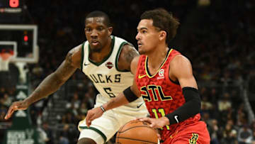 MILWAUKEE, WISCONSIN - NOVEMBER 27: Trae Young #11 of the Atlanta Hawks is defended by Eric Bledsoe #6 of the Milwaukee Bucks during a game at Fiserv Forum on November 27, 2019 in Milwaukee, Wisconsin. NOTE TO USER: User expressly acknowledges and agrees that, by downloading and or using this photograph, User is consenting to the terms and conditions of the Getty Images License Agreement. (Photo by Stacy Revere/Getty Images)