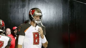 Sep 18, 2014; Atlanta, GA, USA; Tampa Bay Buccaneers quarterback Mike Glennon (8) walks onto the field before their game against the Atlanta Falcons at the Georgia Dome. The Falcons won 56-14. Mandatory Credit: Jason Getz-USA TODAY Sports