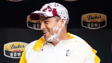 South Carolina GamecocksÕ Head Football Coach Shane Beamer gets interviewed after getting DukeÕs Mayo poured on him after winning against North Carolina Tar Heels after the DukeÕs Mayo Bowl at Bank of America Stadium in Charlotte on Thursday, December 30, 2021.Jg Mayobowl 123021 022
