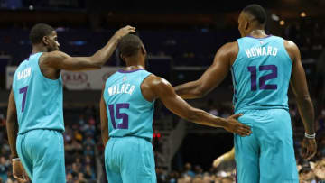 CHARLOTTE, NC - OCTOBER 27: Teammates Dwayne Bacon