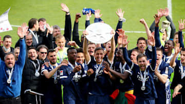 Bochum players celebrate winning the 2. Bundesliga. (Photo by Christof Koepsel/Getty Images)