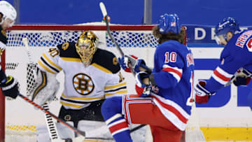 NEW YORK, NEW YORK - FEBRUARY 10: Tuukka Rask #40 of the Boston Bruins makes the stop on Artemi Panarin #10 of the New York Rangers at Madison Square Garden on February 10, 2021 in New York City. The Bruins defeated the Rangers 3-2 in overtime. (Photo by Bruce Bennett/Getty Images)