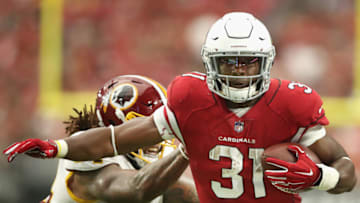 GLENDALE, AZ - SEPTEMBER 09: Running back David Johnson #31 of the Arizona Cardinals rushes the football against the Washington Redskins during the second half of the NFL game at State Farm Stadium on September 9, 2018 in Glendale, Arizona. The Redskins defeated the Cardinals 24-6. (Photo by Christian Petersen/Getty Images)