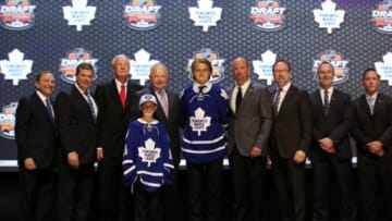 Jun 27, 2014; Philadelphia, PA, USA; William Nylander poses for a photo with team officials after being selected as the number eight overall pick to the Toronto Maple Leafs in the first round of the 2014 NHL Draft at Wells Fargo Center. Mandatory Credit: Bill Streicher-USA TODAY Sports