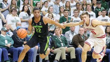 EAST LANSING, MI - JANUARY 19: Miles Bridges drives to the basket while defended by Collin Hartman #30 of the Indiana Hoosiers at Breslin Center on January 19, 2018 in East Lansing, Michigan. (Photo by Rey Del Rio/Getty Images)