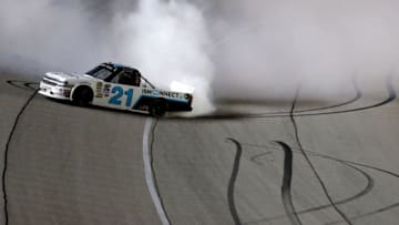 JOLIET, IL - SEPTEMBER 15: Johnny Sauter, driver of the #21 ISMConnect Chevrolet, celebrates with a burnout after winning the NASCAR Camping World Truck Series TheHouse.com 225 at Chicagoland Speedway on September 15, 2017 in Joliet, Illinois. (Photo by Jeff Zelevansky/Getty Images)