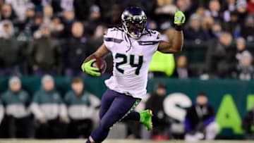 PHILADELPHIA, PENNSYLVANIA - JANUARY 05: Marshawn Lynch #24 of the Seattle Seahawks carries the ball for a first down in the third quarter of the NFC Wild Card Playoff game against the Philadelphia Eagles at Lincoln Financial Field on January 05, 2020 in Philadelphia, Pennsylvania. (Photo by Steven Ryan/Getty Images)
