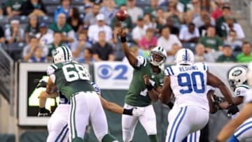 Aug 7, 2014; East Rutherford, NJ, USA; New York Jets quarterback Geno Smith (7) passes against the Indianapolis Colts during the first quarter at MetLife Stadium. Mandatory Credit: Adam Hunger-USA TODAY Sports