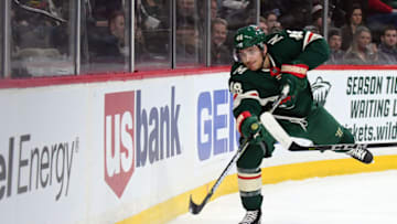 MINNEAPOLIS, MN - FEBRUARY 25: Minnesota Wild Defenceman Jared Spurgeon (46) shoots the puck around the boards during a NHL game between the Minnesota Wild and San Jose Sharks on February 25, 2018 at Xcel Energy Center in St. Paul, MN. The Wild defeated the Sharks 3-2 in overtime.(Photo by Nick Wosika/Icon Sportswire via Getty Images)